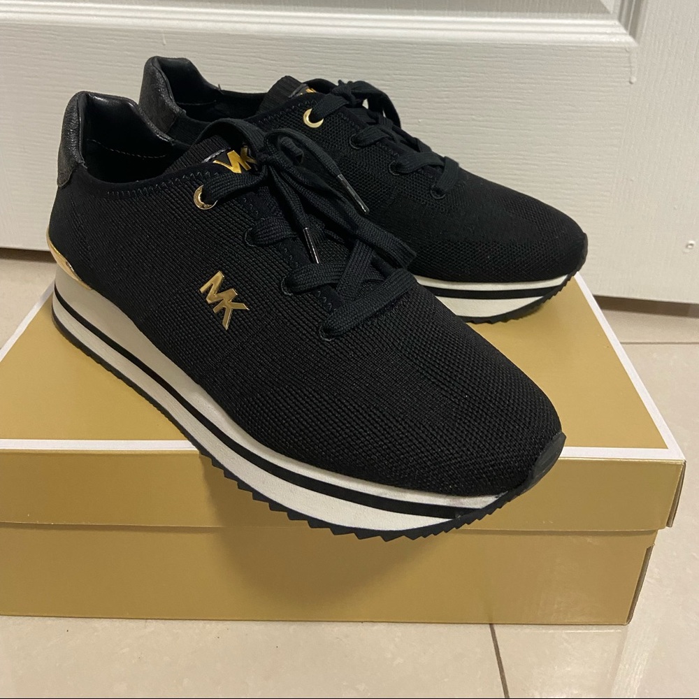 Michael Kors brand new sneakers with box. Never worn.